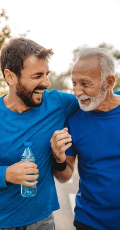 two happy men who are pain free