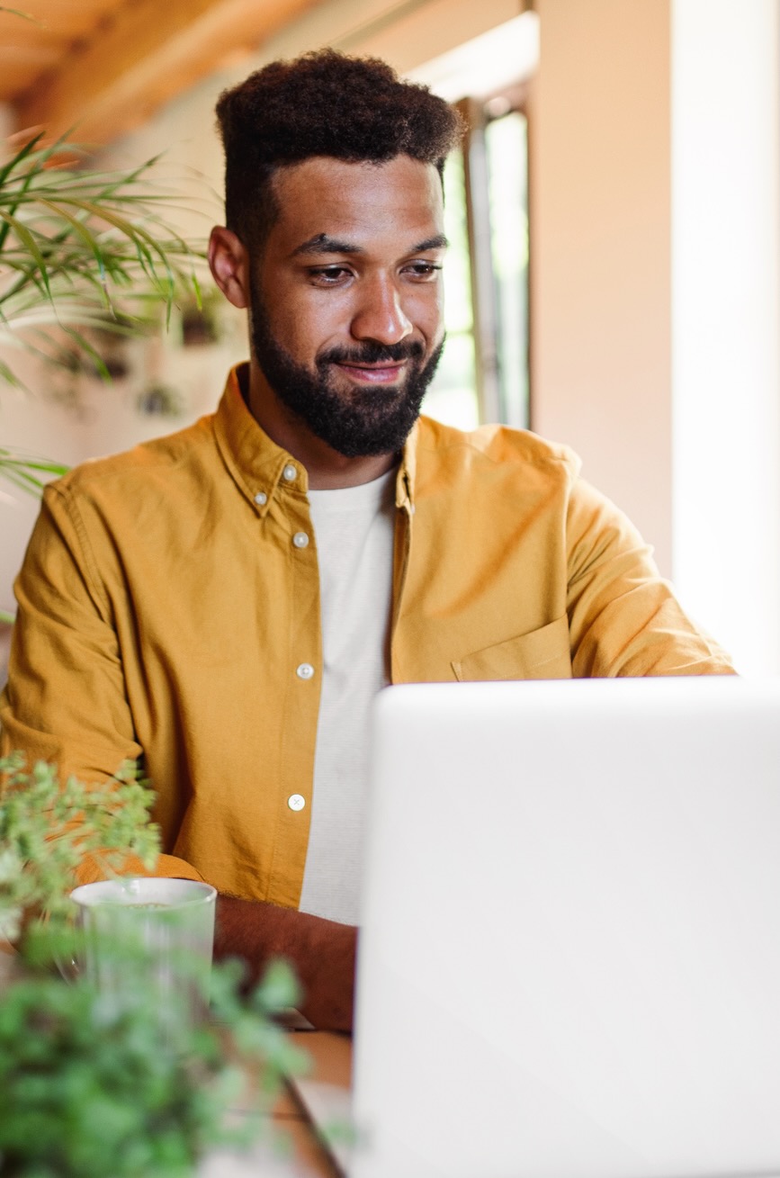man looking at computer